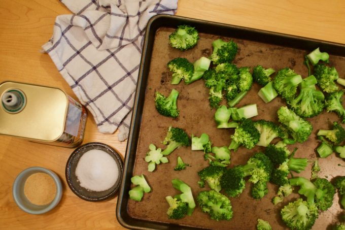Broccoli on a sheet tray to roast